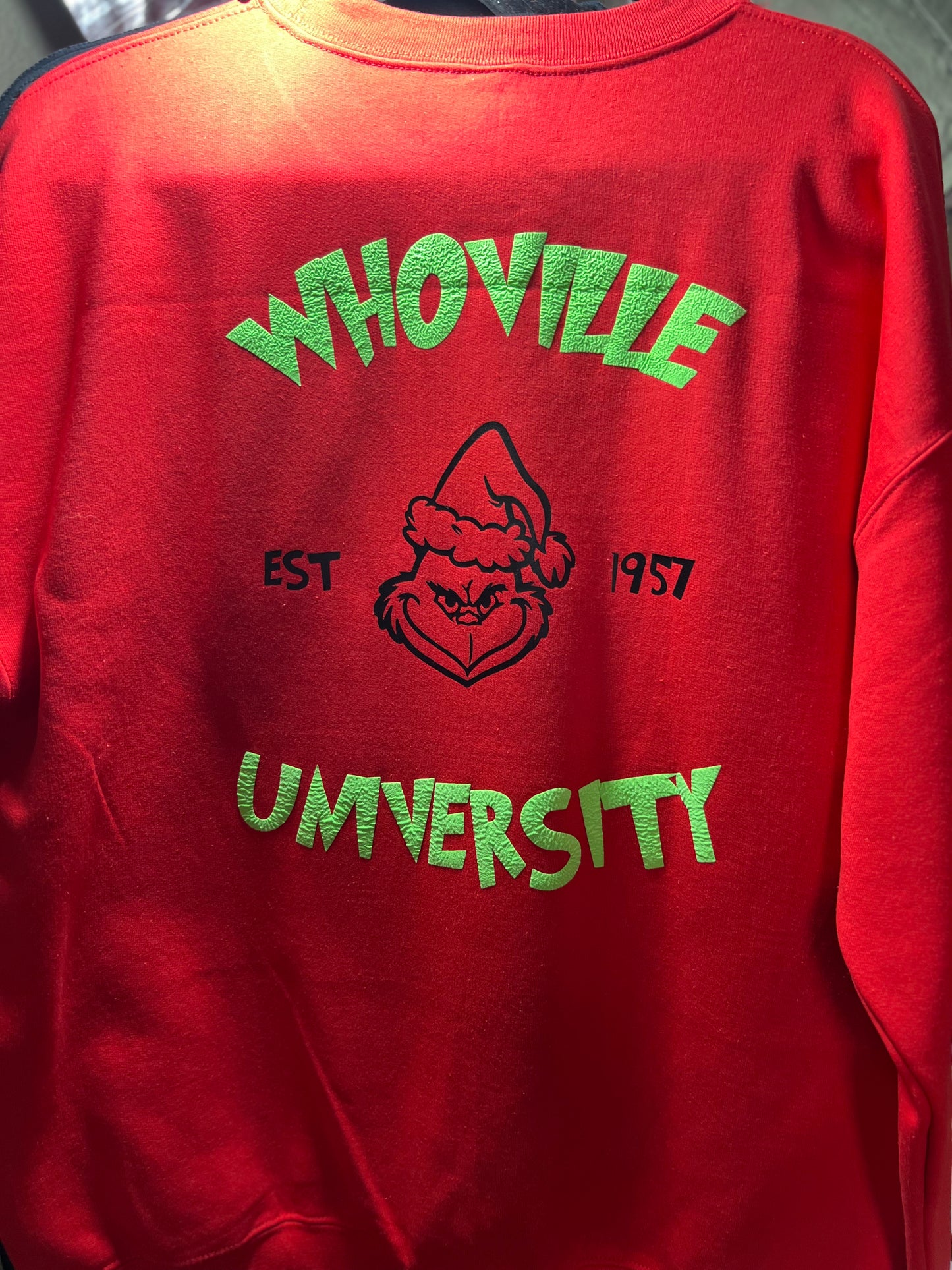 Cozy Up in Style with Whoville University Red Grinch Sweatshirt – Limited Edition Comfort for the Festive Season!
