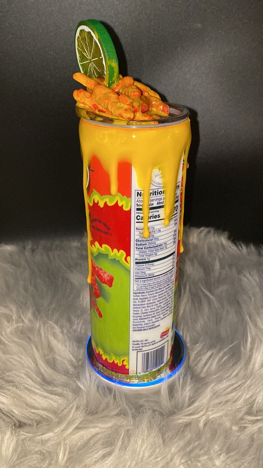 Hot cheetos 20oz stainless steel tumbler with custom Cheetos on lid.